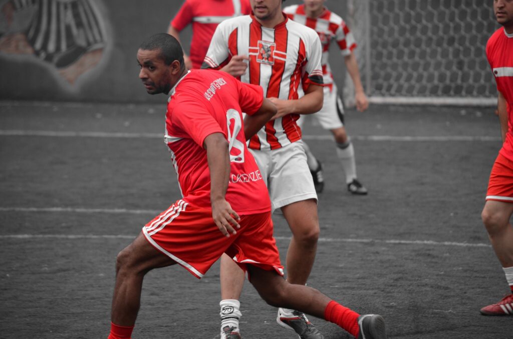 players playing football